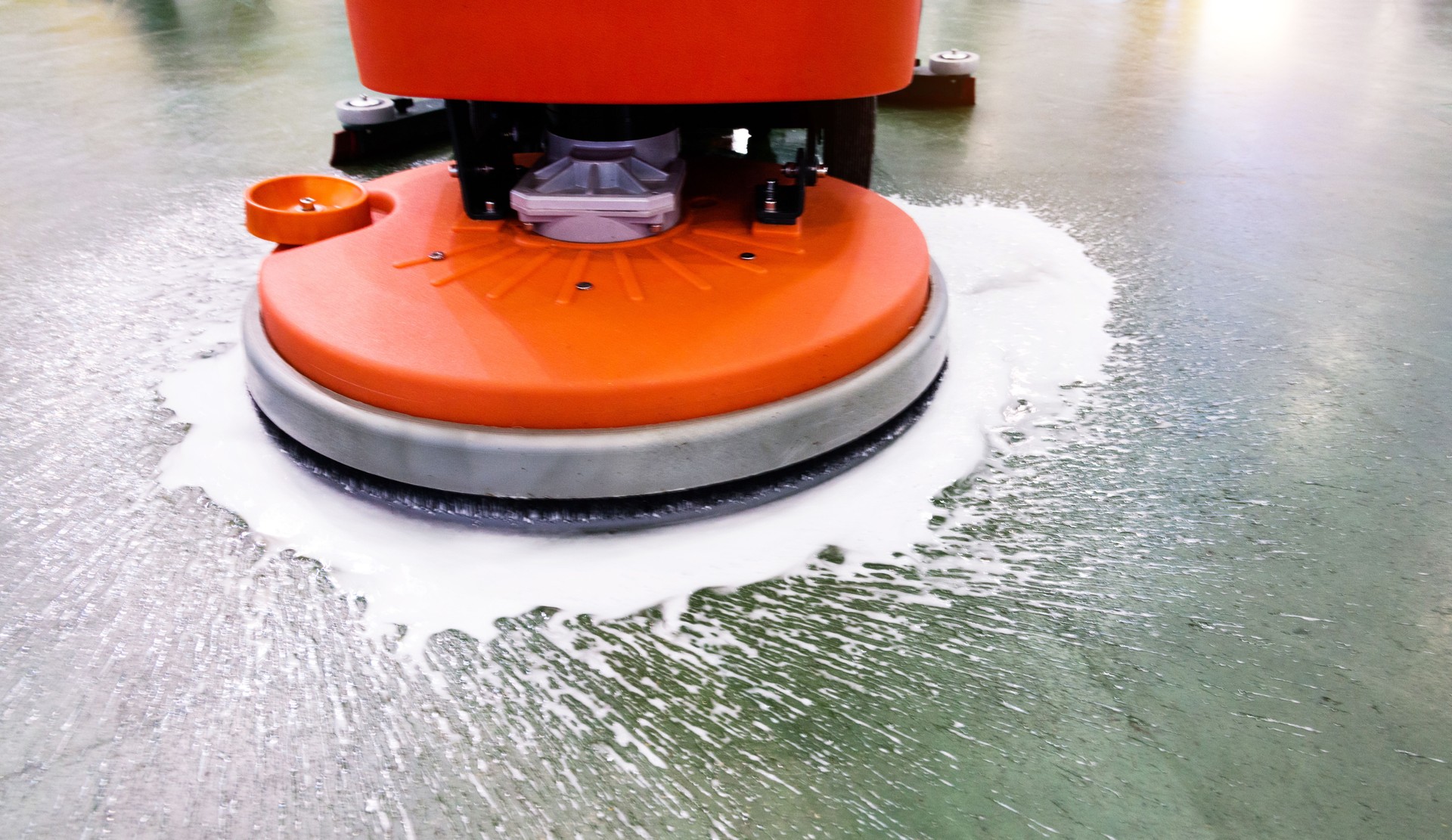 Cleaning floor with buffing machine